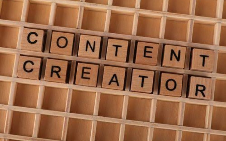 Wooden letter tiles spelling Content Creator